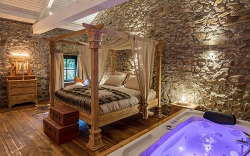 Image du la suite le loft (lit et jacuzzi)